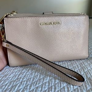 Nude leather wristlet
